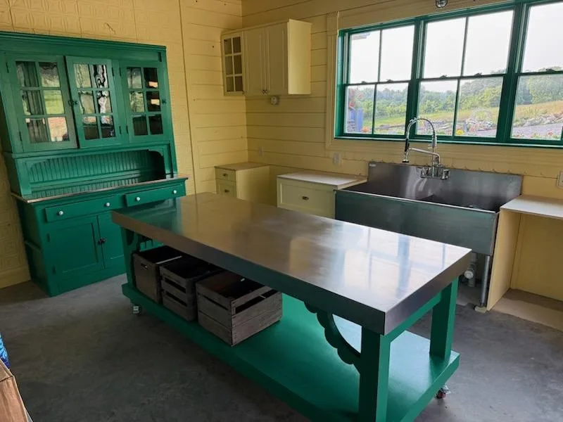 Finished custom stainless steel worktable and sink installed in a Middle Tennessee workspace