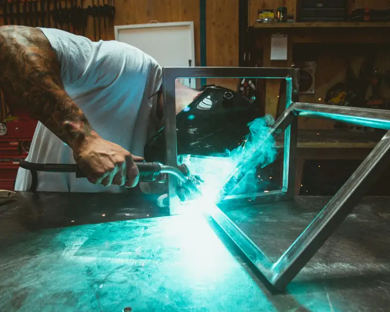 Music City Specialty Welding fabricating a steel frame in the shop